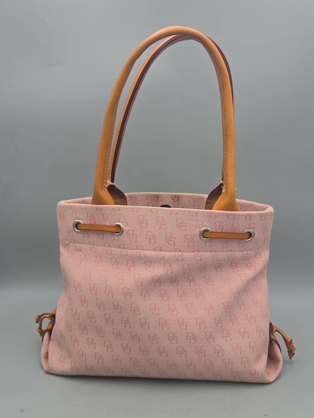 Dooney Bourke DB Monogram Drawstring Tote Canvas Leather Tassel Pink